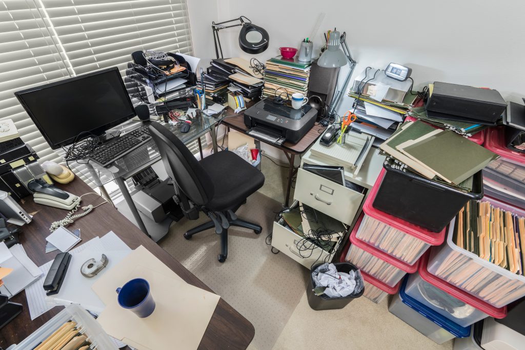 Cluttered home office space