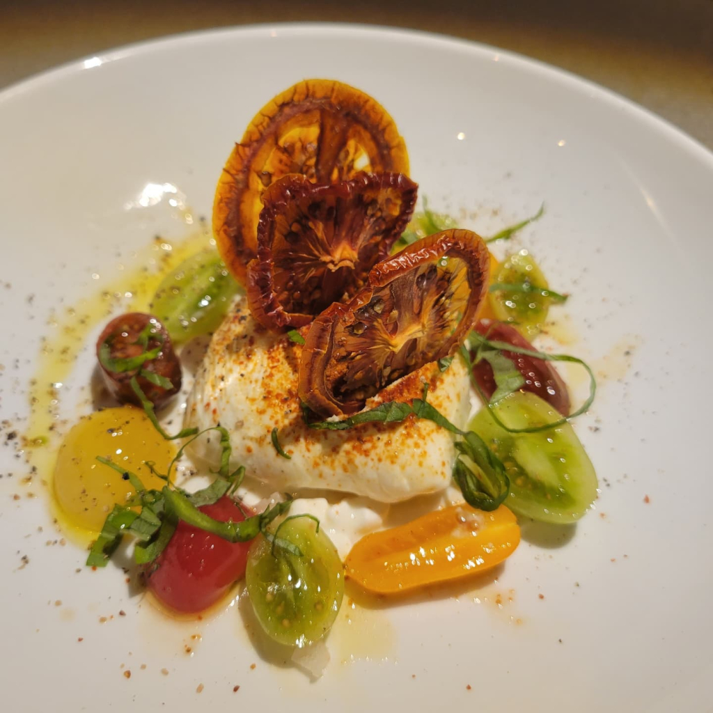 Elaborate dish with tomatoes and dried lemon