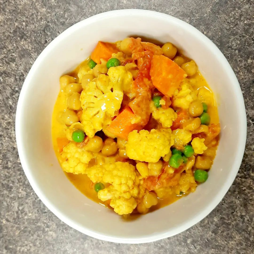Golden Curry, featuring cauliflower, carrot, tomato, chick and green pea