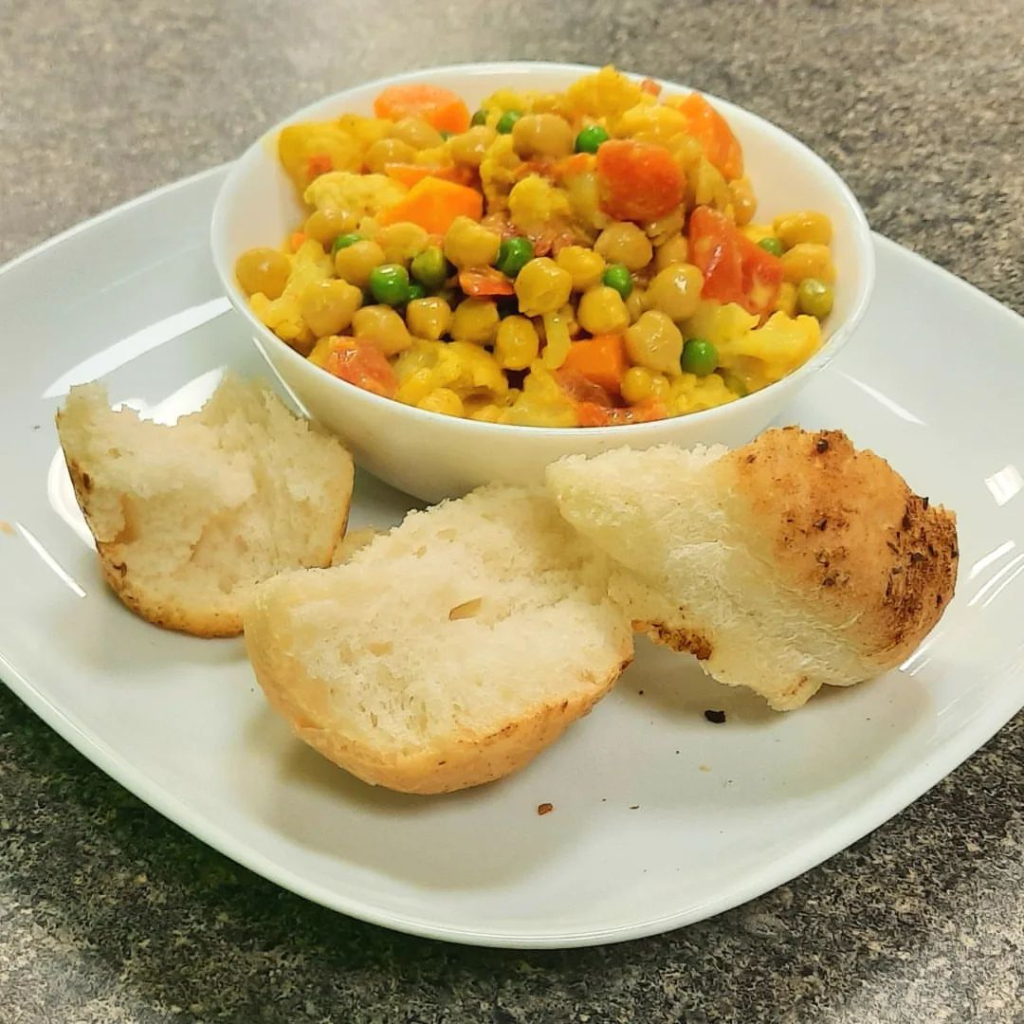 Golden Curry with a harissa-spiced crusty bun